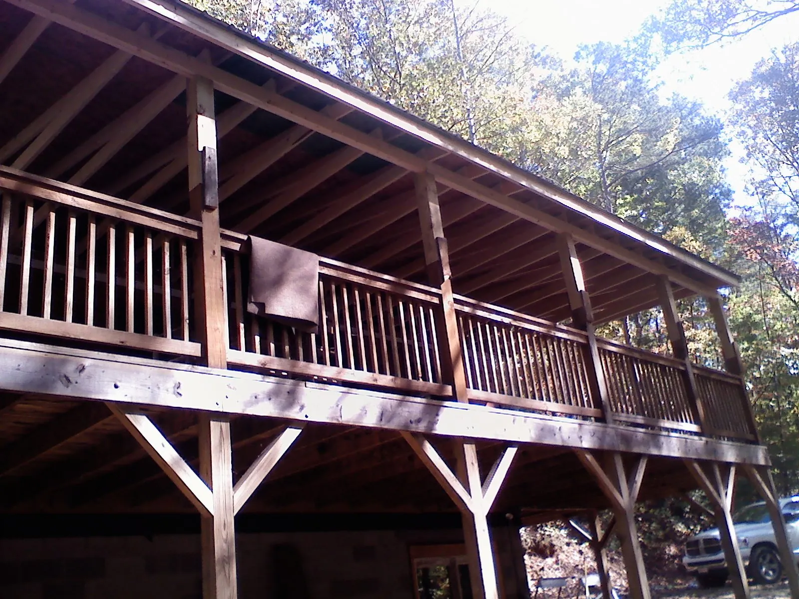 Timber framing under a new elevated porch and deck — Roof Leak Repair in Lake Oswego by Roofing Brothers